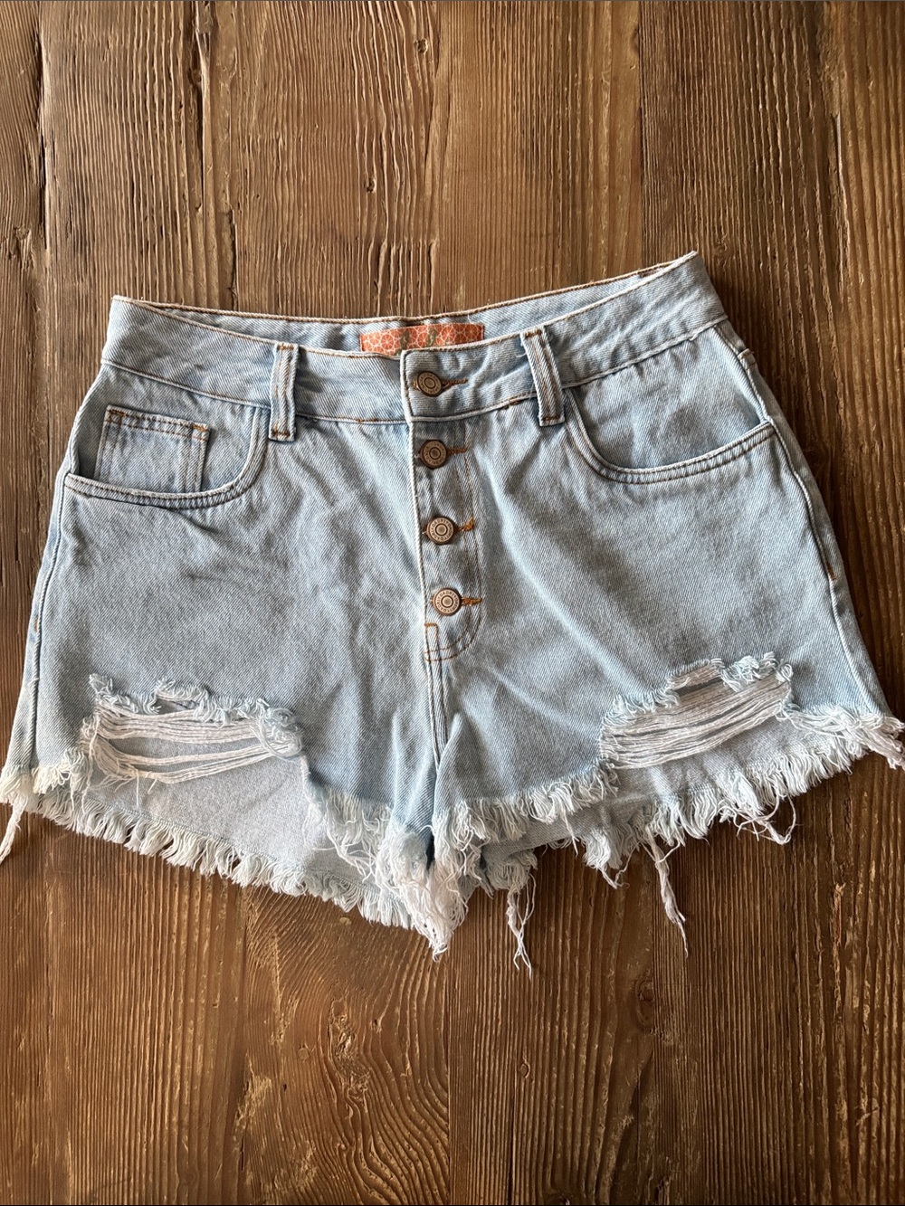 High-Rise Light Blue Distressed Denim Shorts